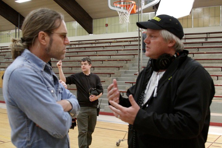 Conferring with musician/actor Big Kenny the set of The Frontier Boys with