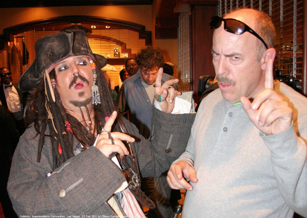 Discussing weighty matters with Captain Jack at a celebrity impersonators convention in Las Vegas.