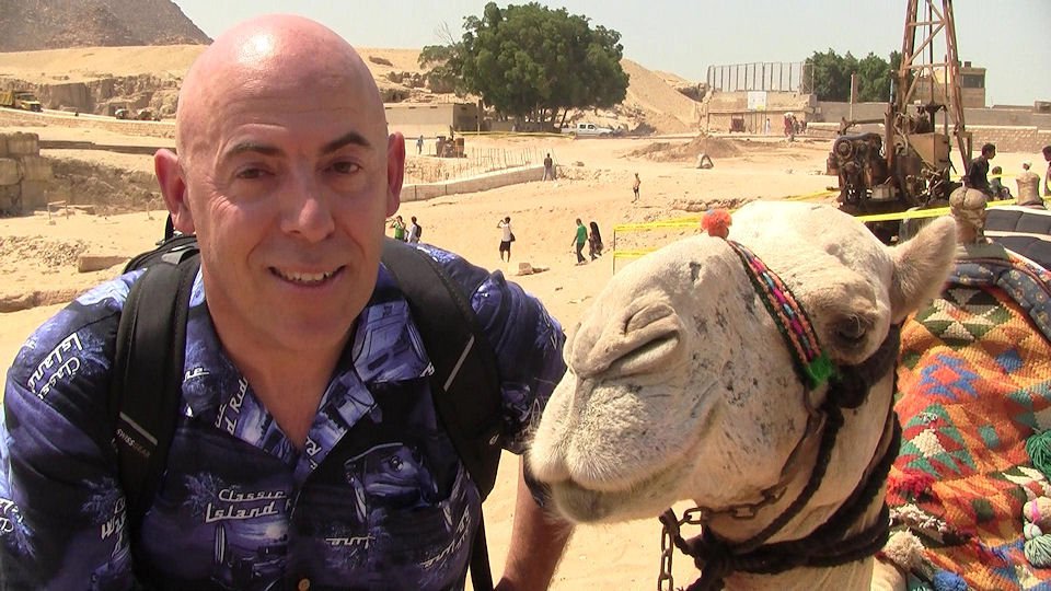 Discussing world politics with a Cairo resident at the Giza Pyramids