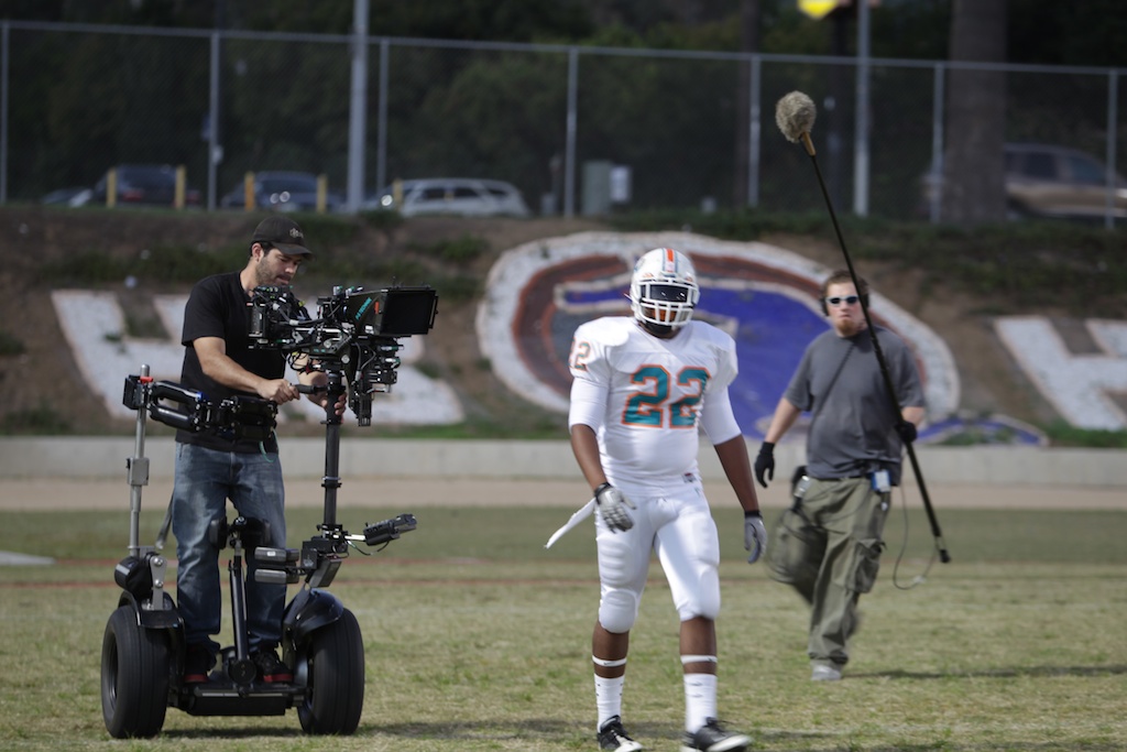 On Handsfree segway during filming of a 3D football movie