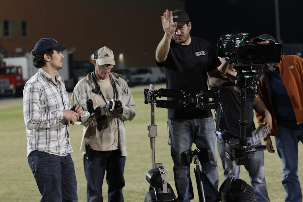 On Handsfree segway during filming of a 3D football movie. Working with DIRECTOR - James Franco