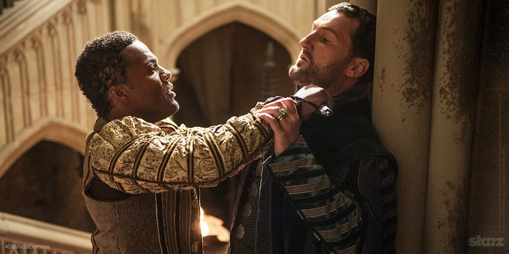 As Francesco Sassetti in 'Da Vinci's Demons' with Ray Fearon as Carlo de Medici.