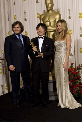 Academy Award®-winner Kunio Kato (center) with presenters (left to right) Jack Black and Jennifer Aniston backstage at the 81st Academy Awards® are presented live on the ABC Television network from The Kodak Theatre in Hollywood, CA, Sunday, February 22, 2009.