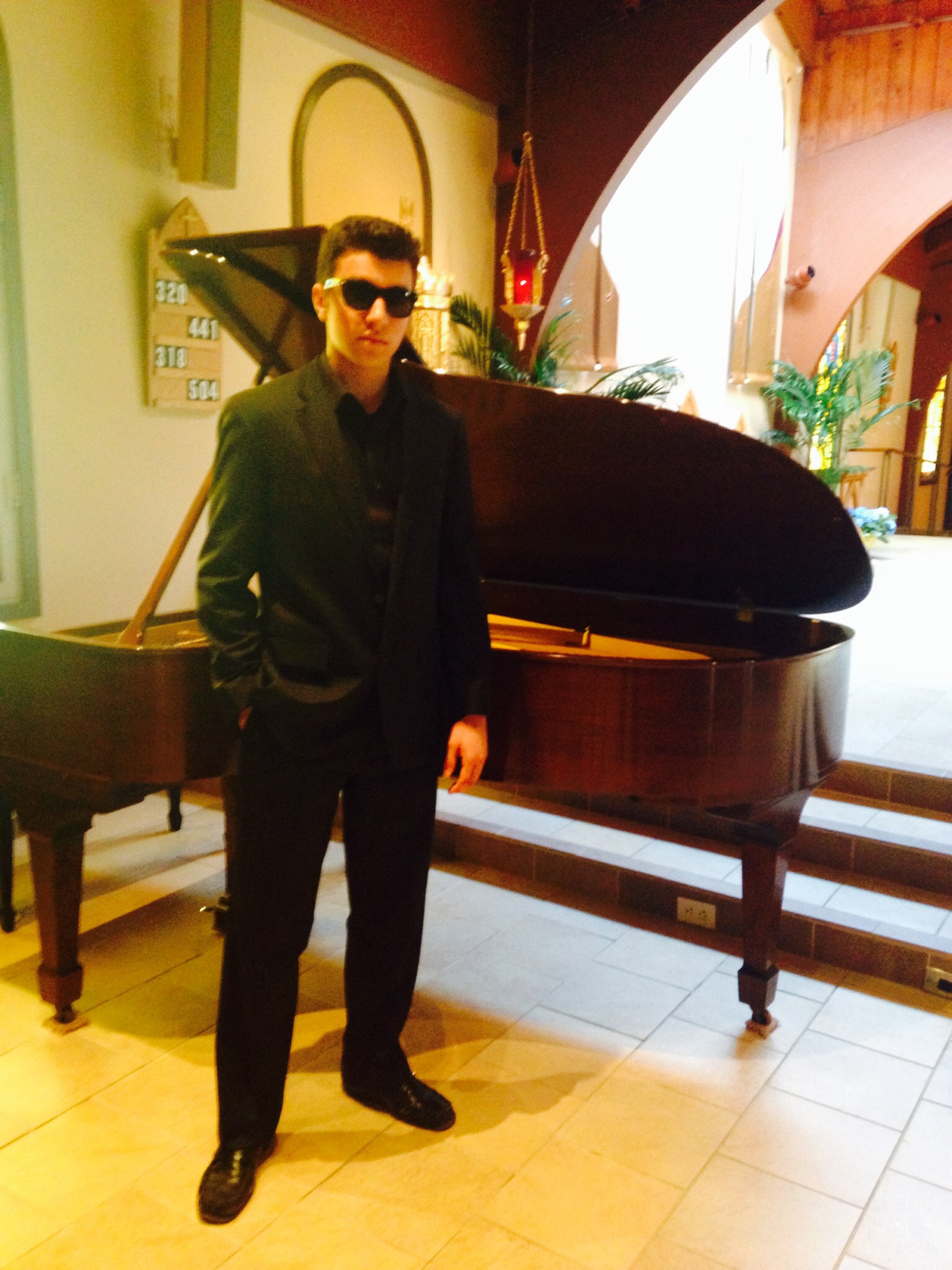 Christopher McGinnis plays a Steinway grand at Holy Spirit Church for his new video 