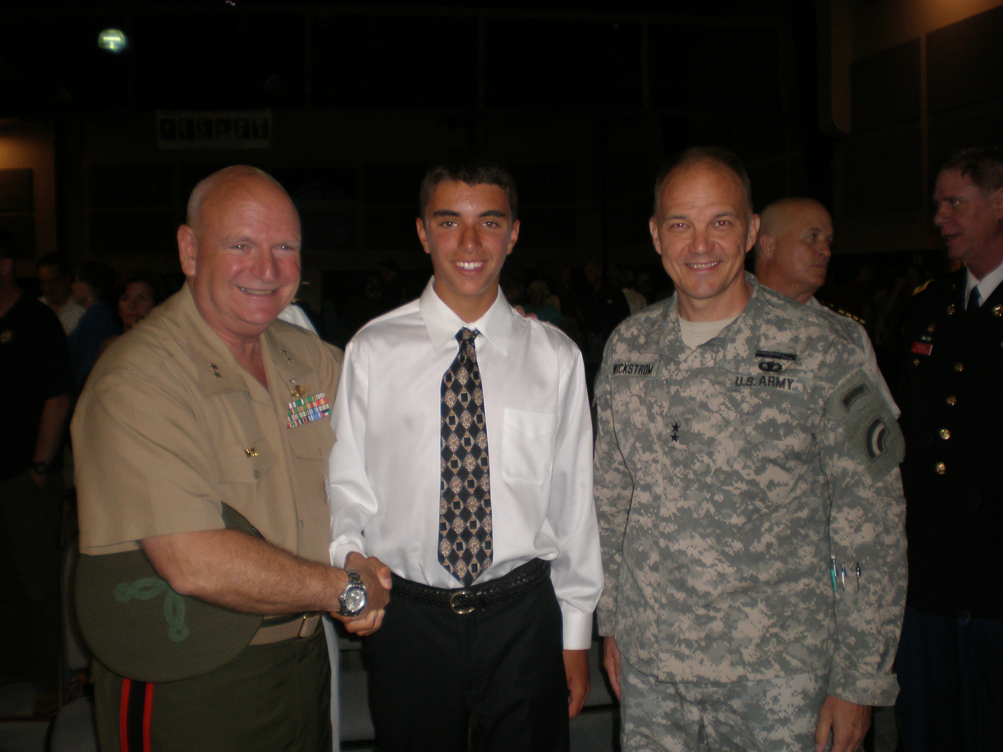 Christopher with General Wolff, Commander of the Navy Militia and Major General Steve Wickstrom of US Army recognition of Christophers song he wrote for our Veterans.