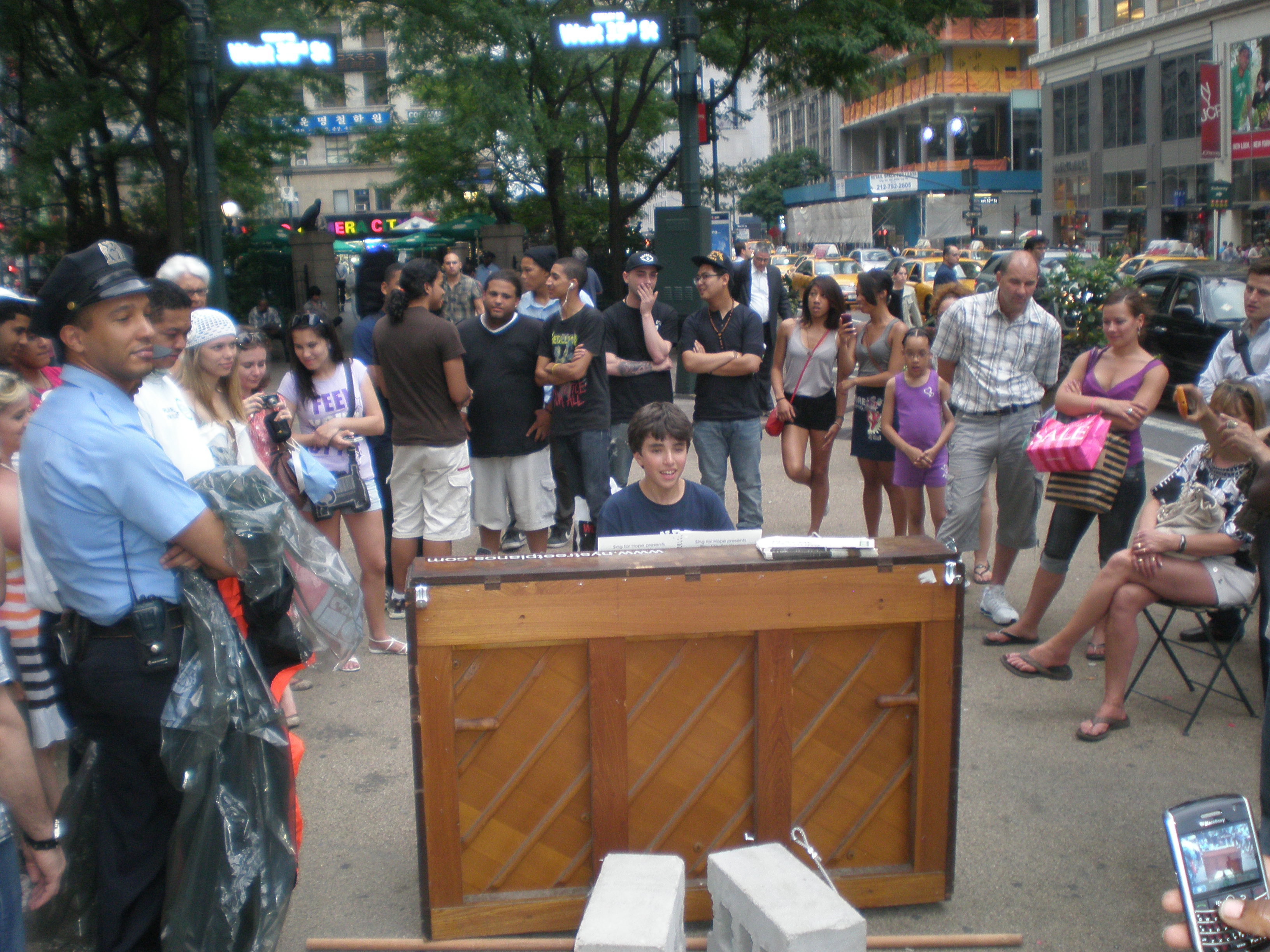 Christopher played piano and sang in Central Park, performed in Times Square and in front of Macys for the MMNY Festival 2010