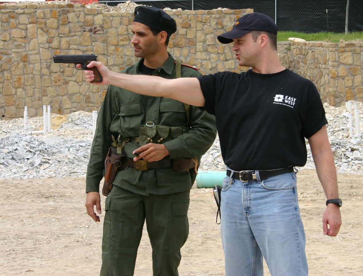 On set directing a soldier for 