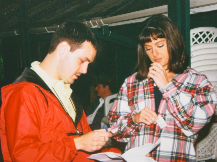 R. Scott Leisk discusses a scene with actress Camille Bresie on the set of Last Night I Fell Again.