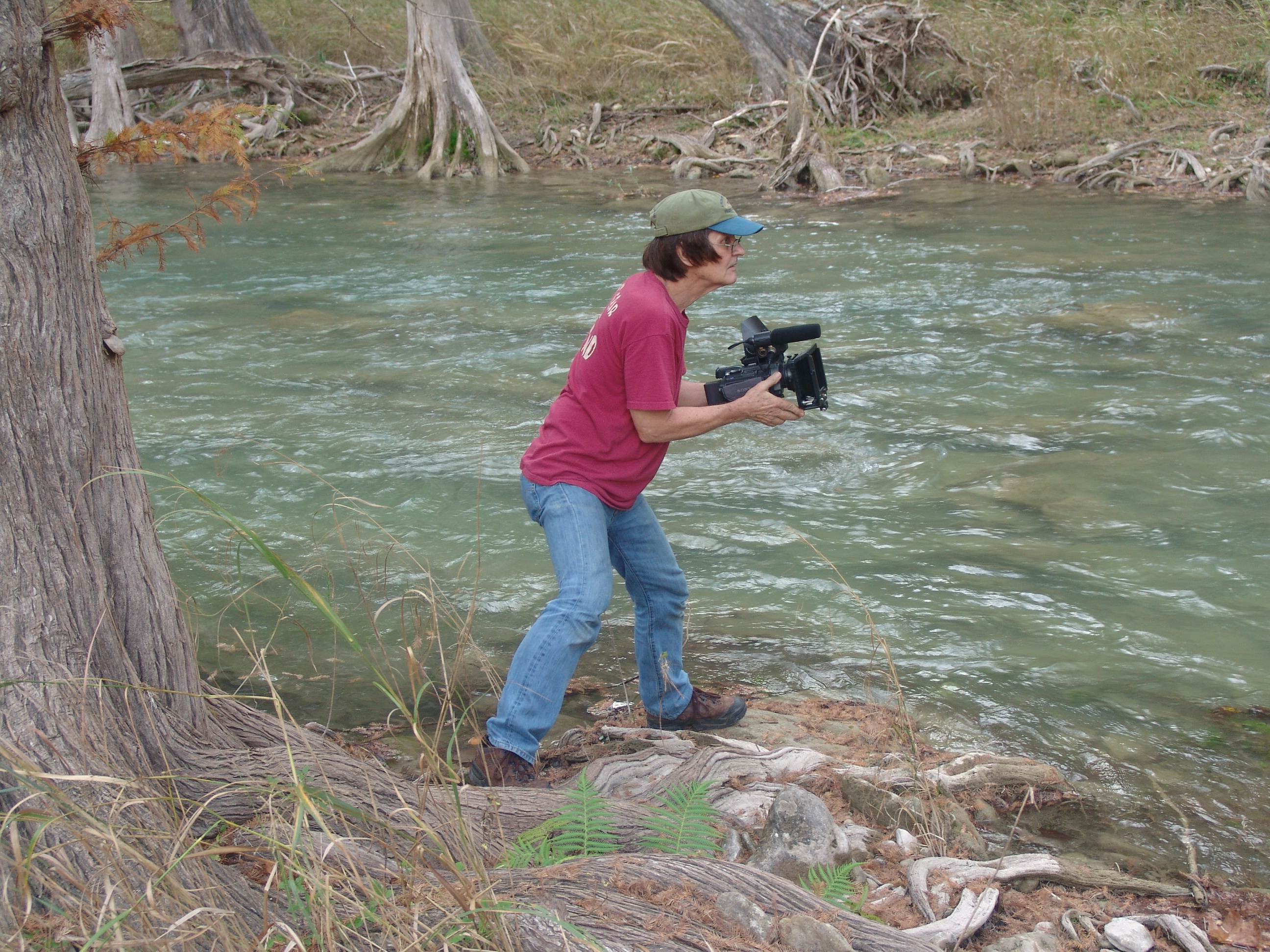 Rodger Marion shooting a hand-held shot at the Blanco River.