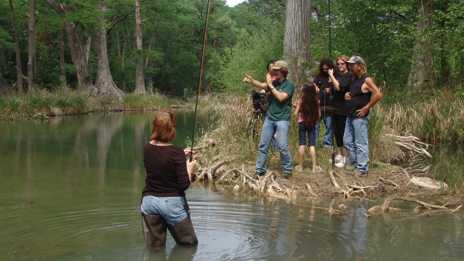 crew filming on the Blanco River. The director, Rodger Marion, is in the green shirt.