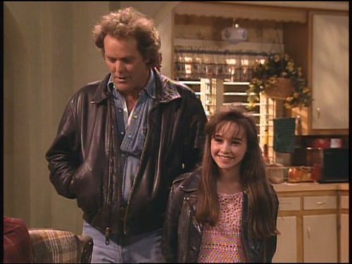 Still of Danielle Harris and Wings Hauser in Roseanne (1988)