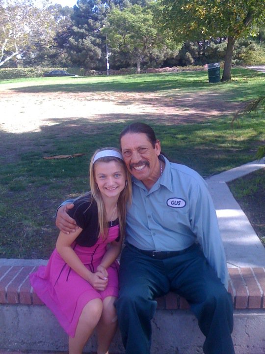 Laci with Danny Trejo on the set of Modern Family