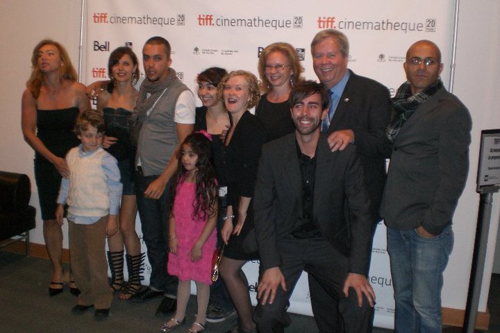 cast and crew on the red carpet at TIFF for the première of Open Window