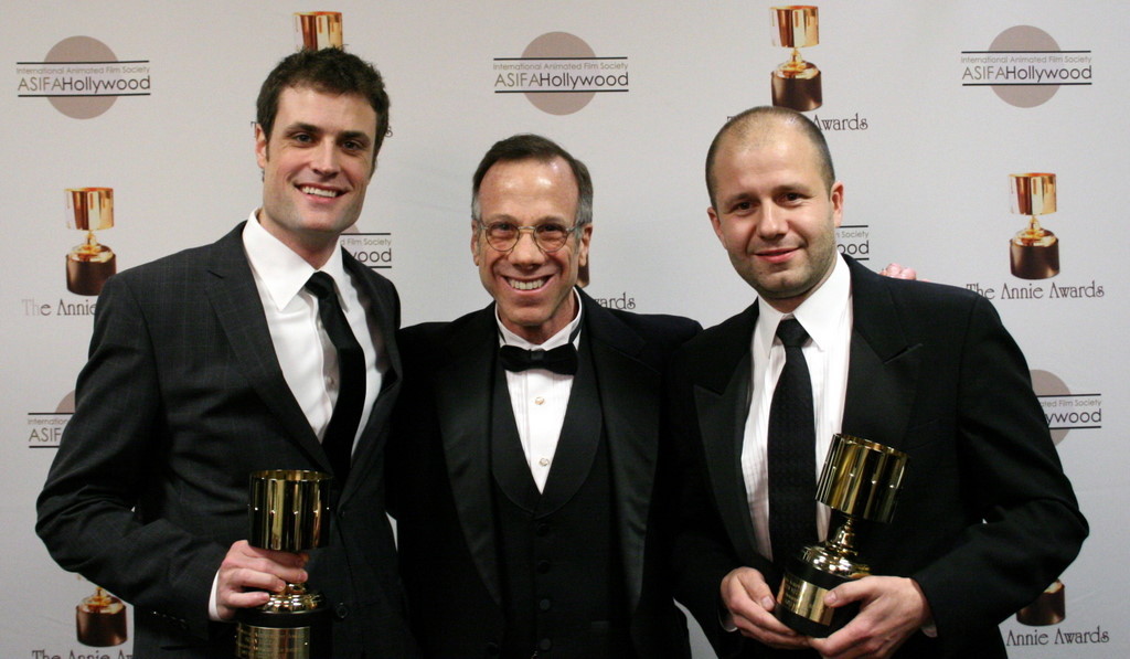 Special achievement award winners Brian McLean and Martin Meunier surround presenter Frank Gladstone