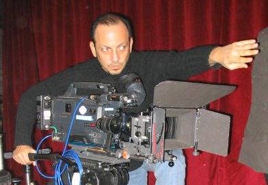 Film director, writer Gianfranco Serraino on the set of No More Terrorism, No More War. Italy, 2004.