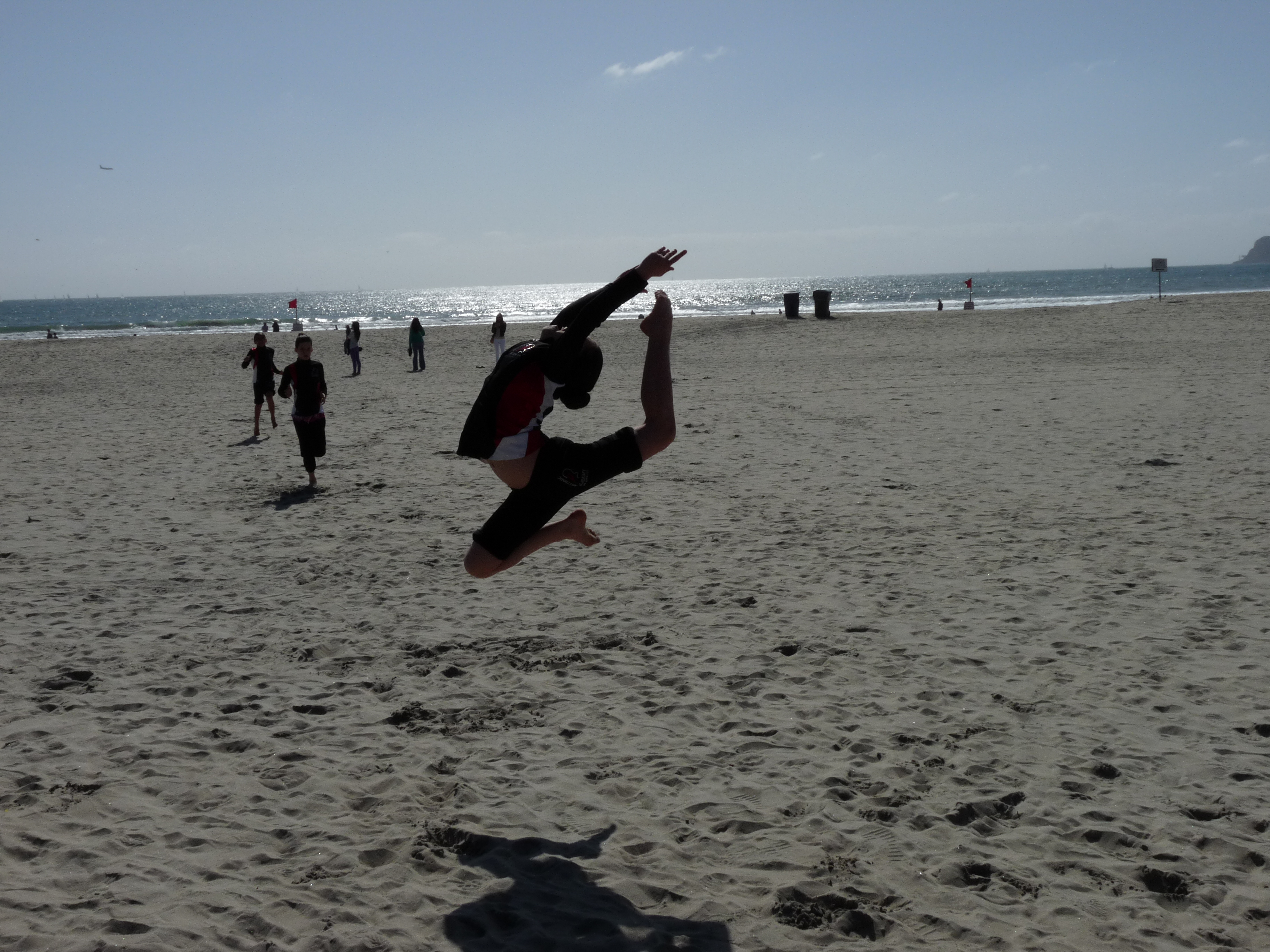 Danielle doing double stag on the beach.