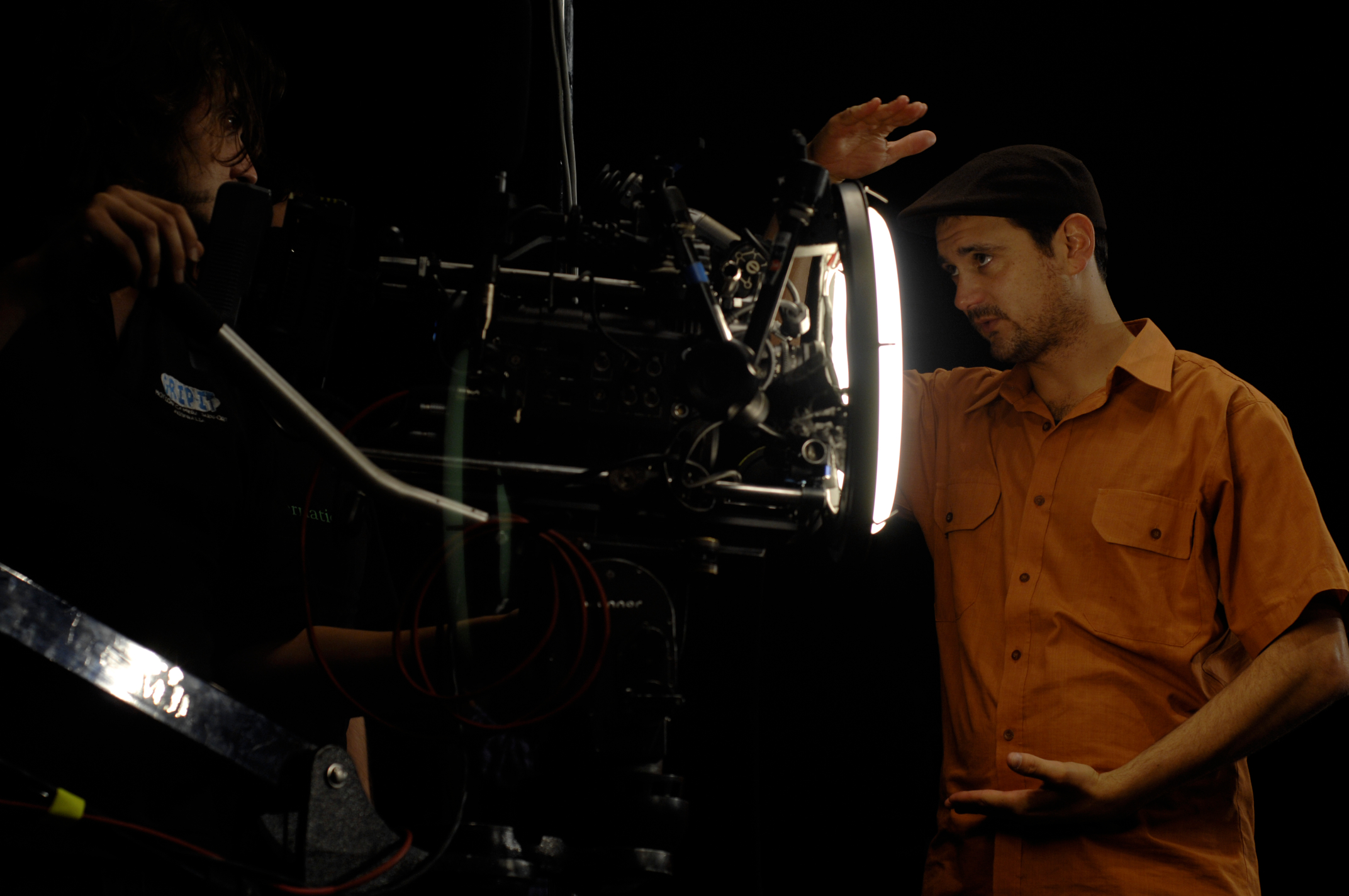 Directing on set for hip hop group Diafrix's Lets Go music video, with cinematographer David Hawkins.