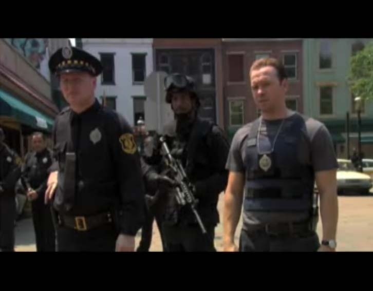 Portraying a police officer in a scene with Donnie Wahlberg, from Spike TV's 