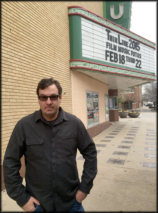 Ted Fisher stands outside the Campus Theater during the Thin Line Film Festival, Saturday, February 21, 2015.