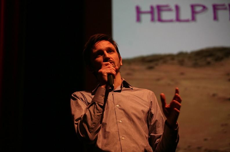 James Card introduces HELP FROM THE WEST at its premiere screening, BAFTA, April 2012.