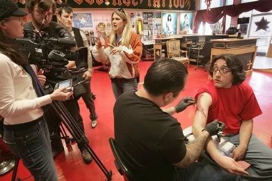 Joshua Sandoval gets inked by Corey Miller at High Voltage Tattoo during taping for the show 
