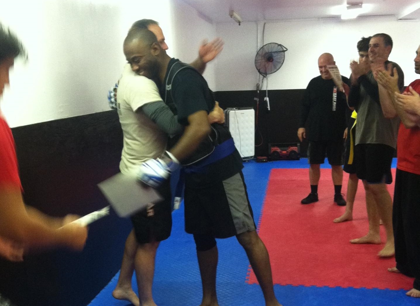 Receiving my Blue Belt in Krav Maga from Instructor Chris Crouch in Dec. 2014