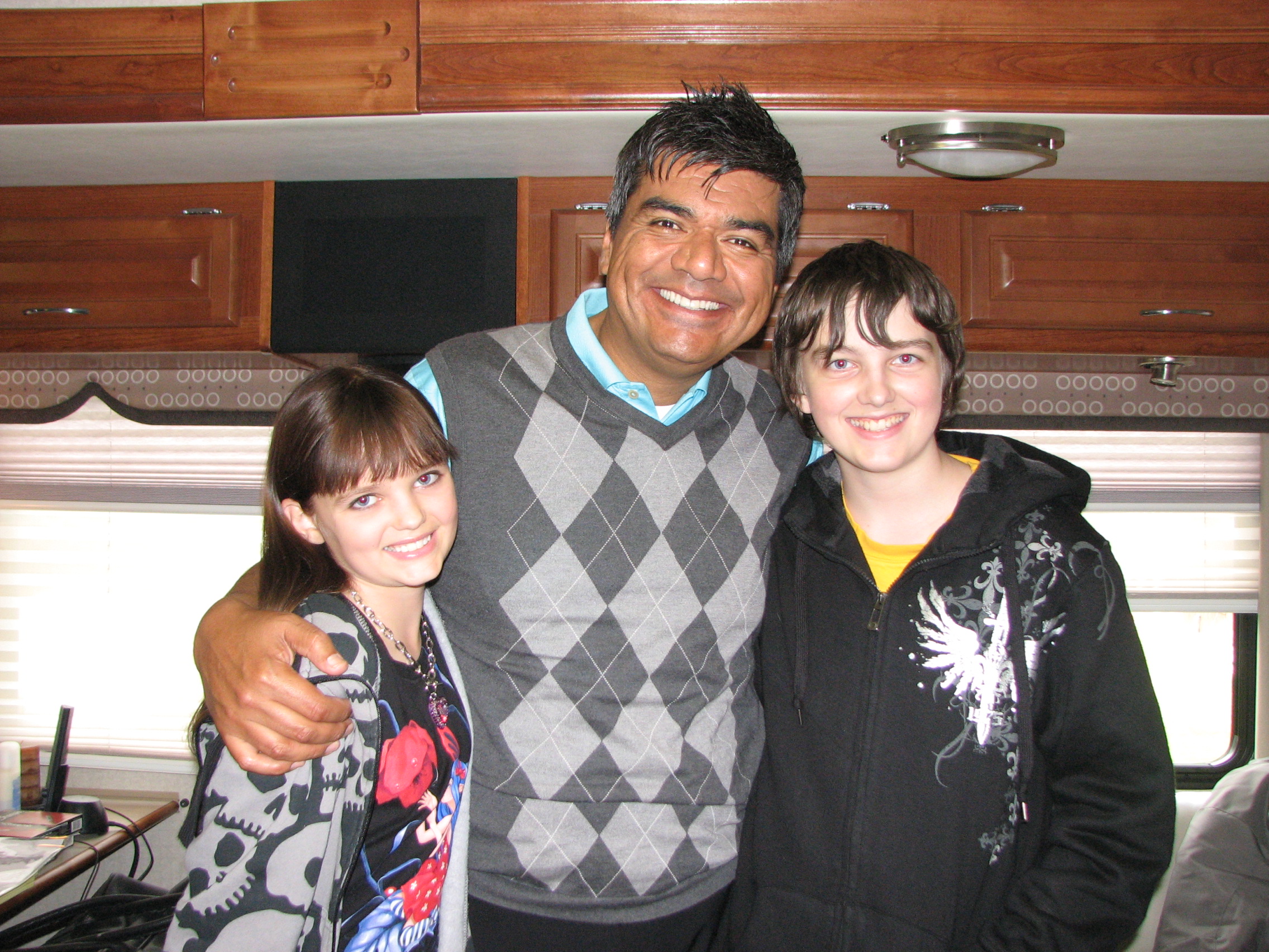 Laine and Donnie MacNeil with George Lopez on the set of Mr. Troop Mom