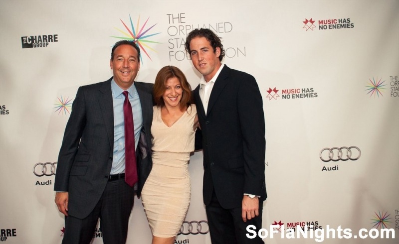 Ron Stein, Producer Reyna Rosenshein, and her boyfriend, Eric, at Orphaned Starfish Miami 2013 Gala.