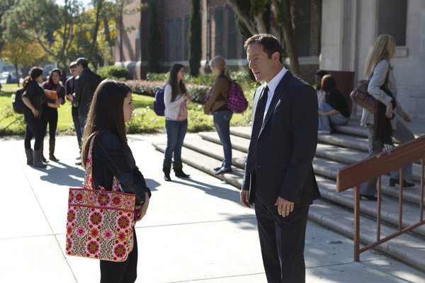 Still of Jason Isaacs and Daniela Bobadilla in Awake (2012)