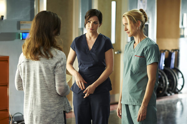 Still of Michelle Nolden and Erica Durance in Saving Hope (2012)