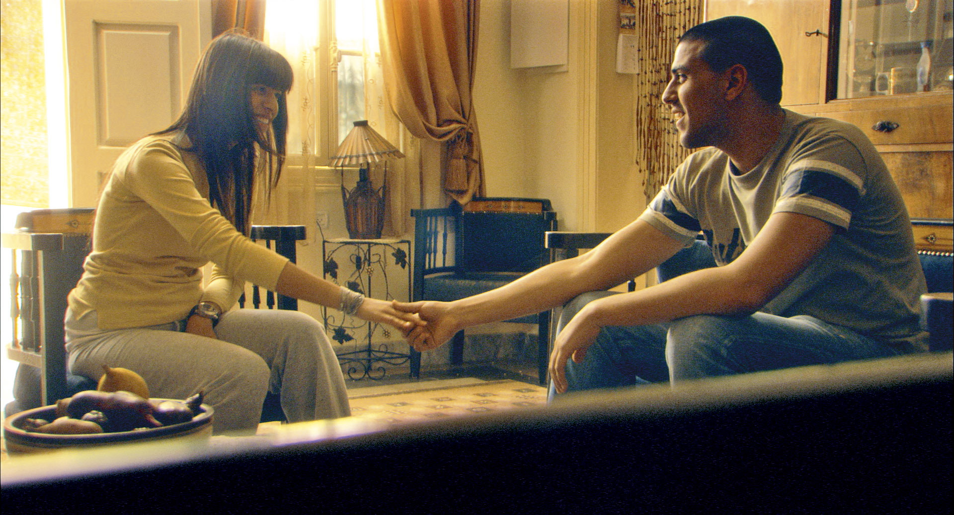 Still of Shahir Kabaha and Ranin Karim in Ajami (2009)