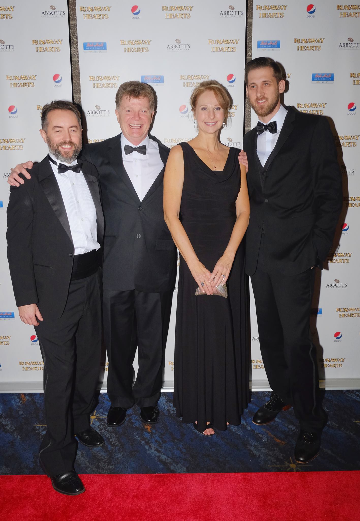 Keith Alan Morris (Director), Scott Sandsberry (Writer/Producer), Rhonda Sandsberry (Producer), and Adam Ketcham (Line Producer) at the Red Carpet Premiere of Runaway Hearts.