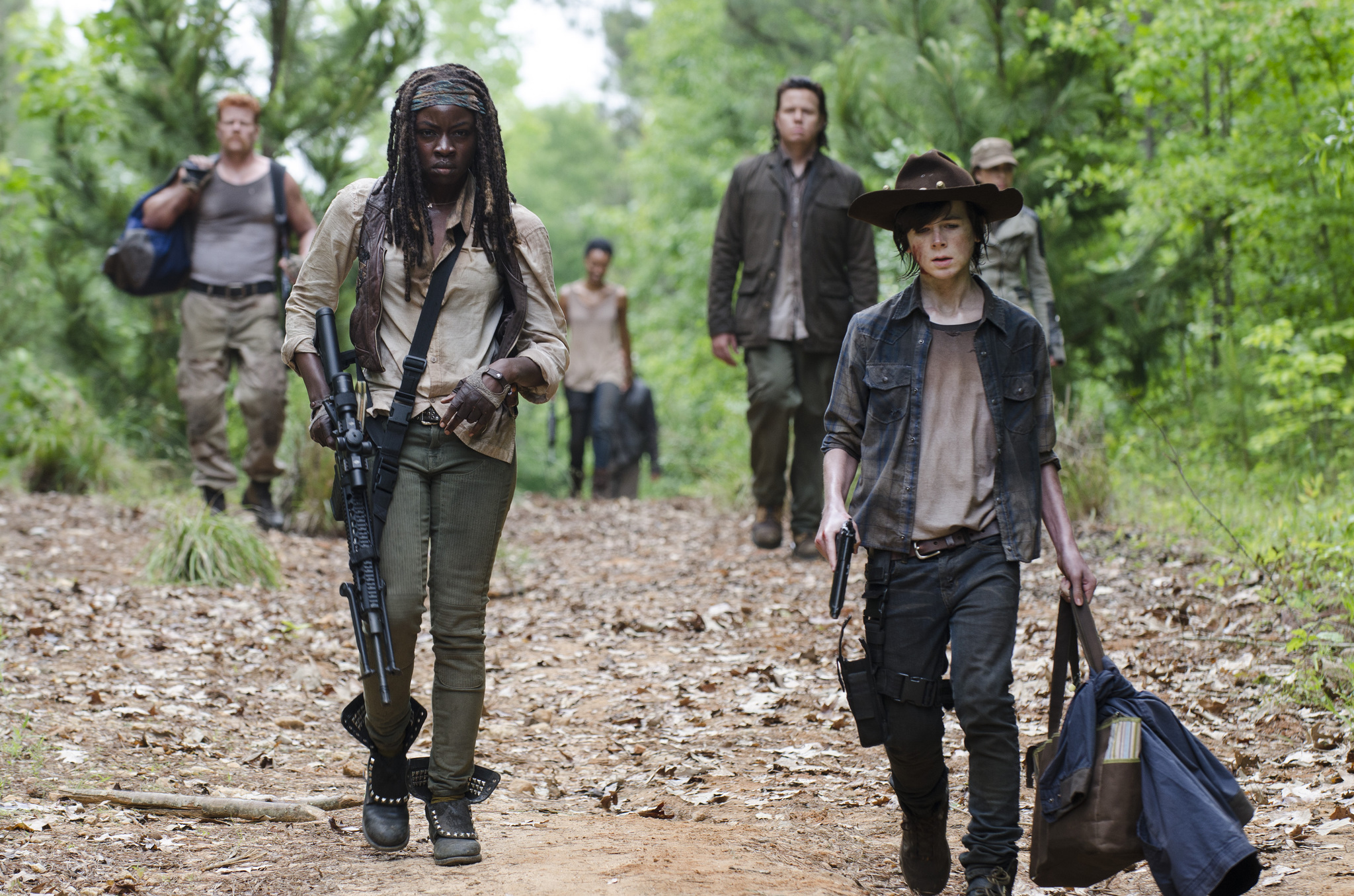 Still of Michael Cudlitz, Danai Gurira, Josh McDermitt and Chandler Riggs in Vaiksciojantys negyveliai (2010)