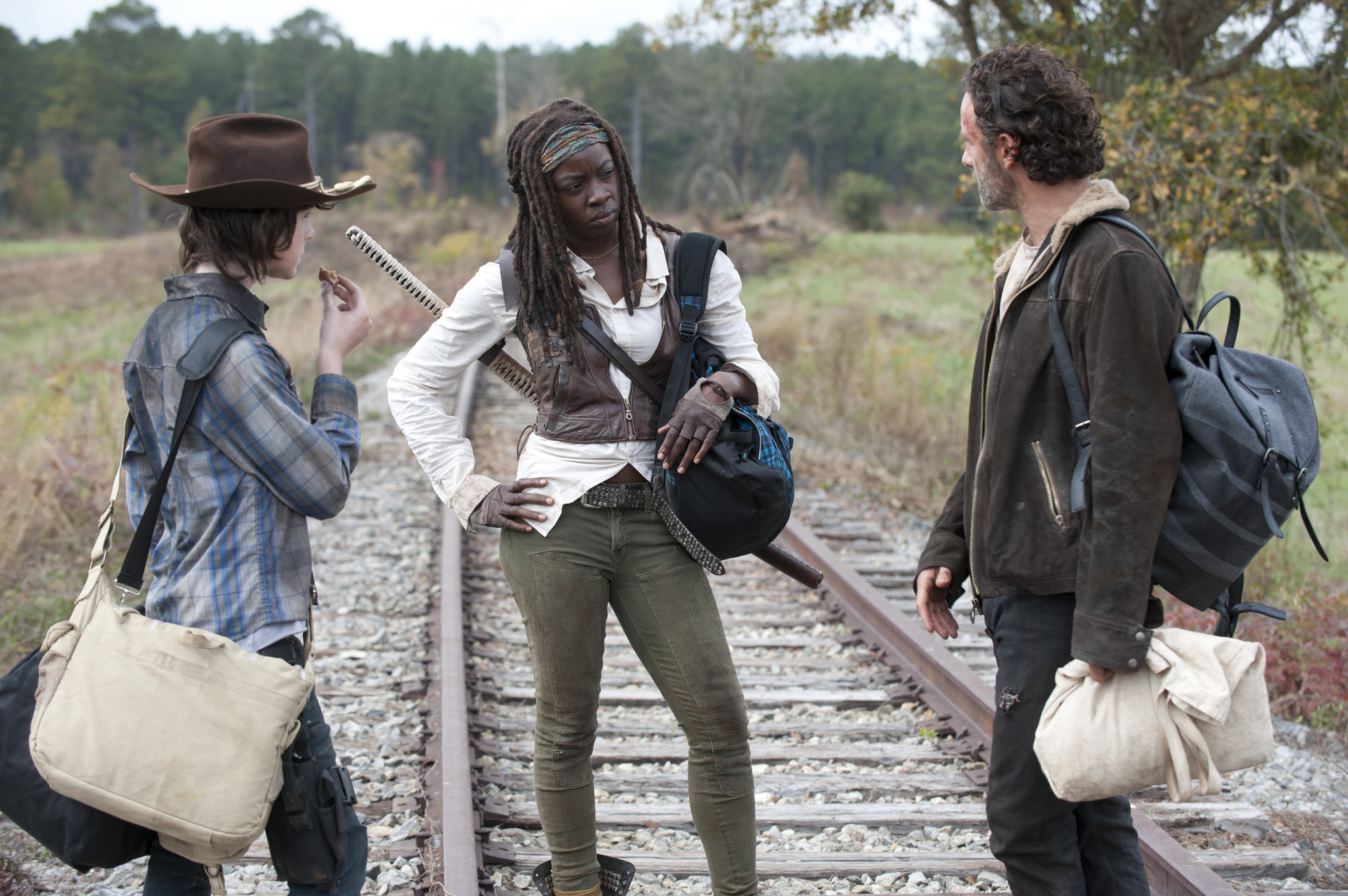 Still of Andrew Lincoln, Danai Gurira and Chandler Riggs in Vaiksciojantys negyveliai: Us (2014)