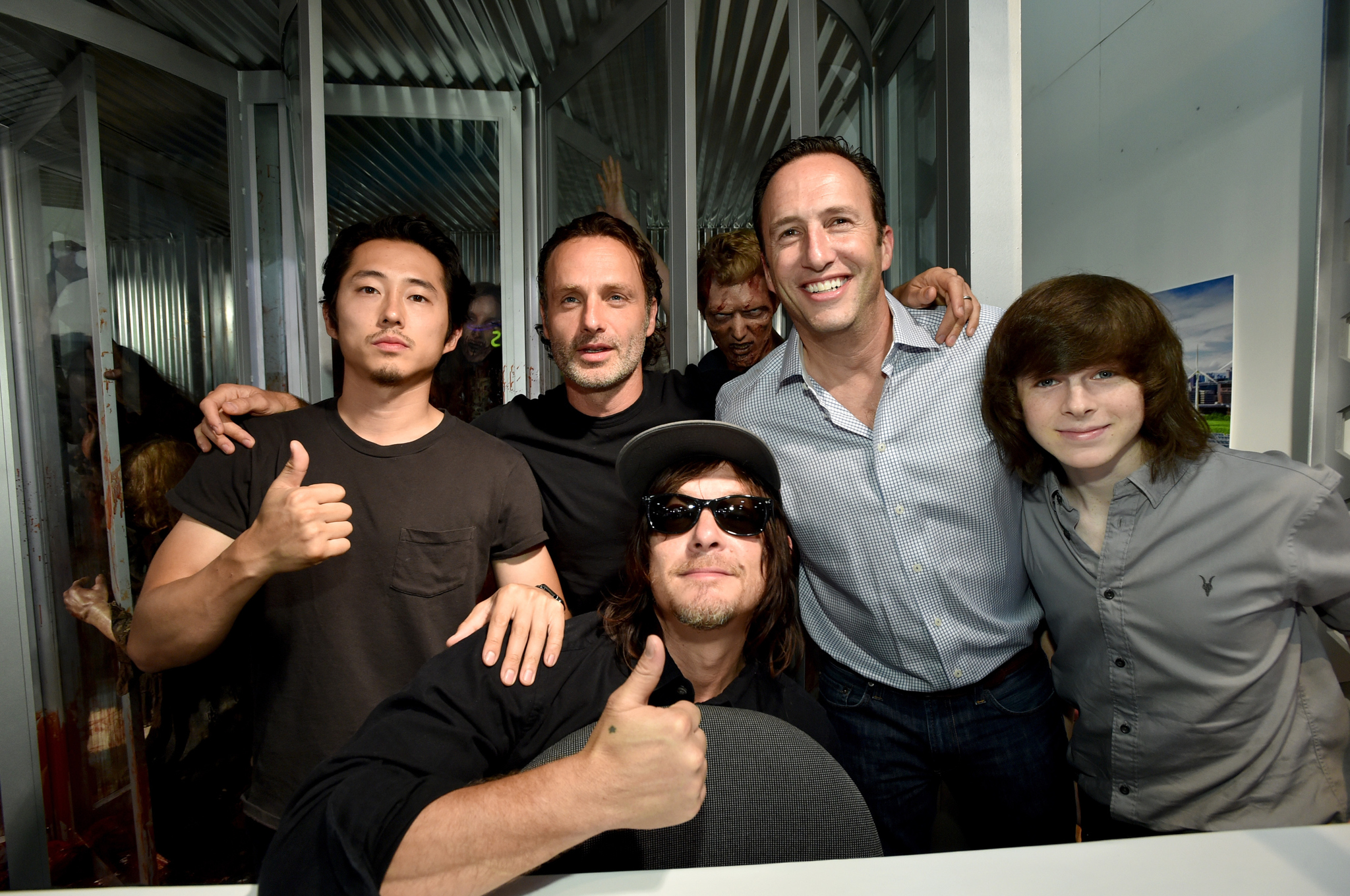 Norman Reedus, Andrew Lincoln, Charlie Collier, Steven Yeun and Chandler Riggs at event of Vaiksciojantys negyveliai (2010)