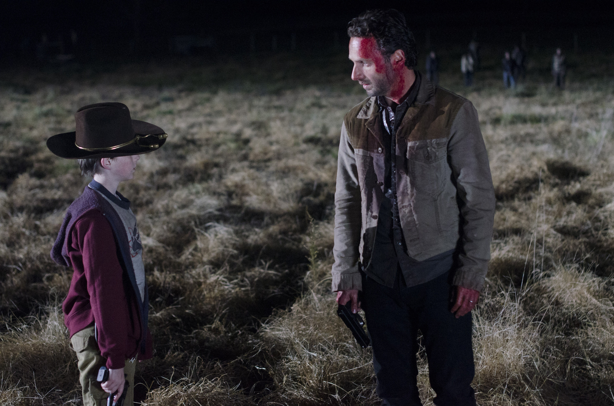 Still of Andrew Lincoln and Chandler Riggs in Vaiksciojantys negyveliai (2010)