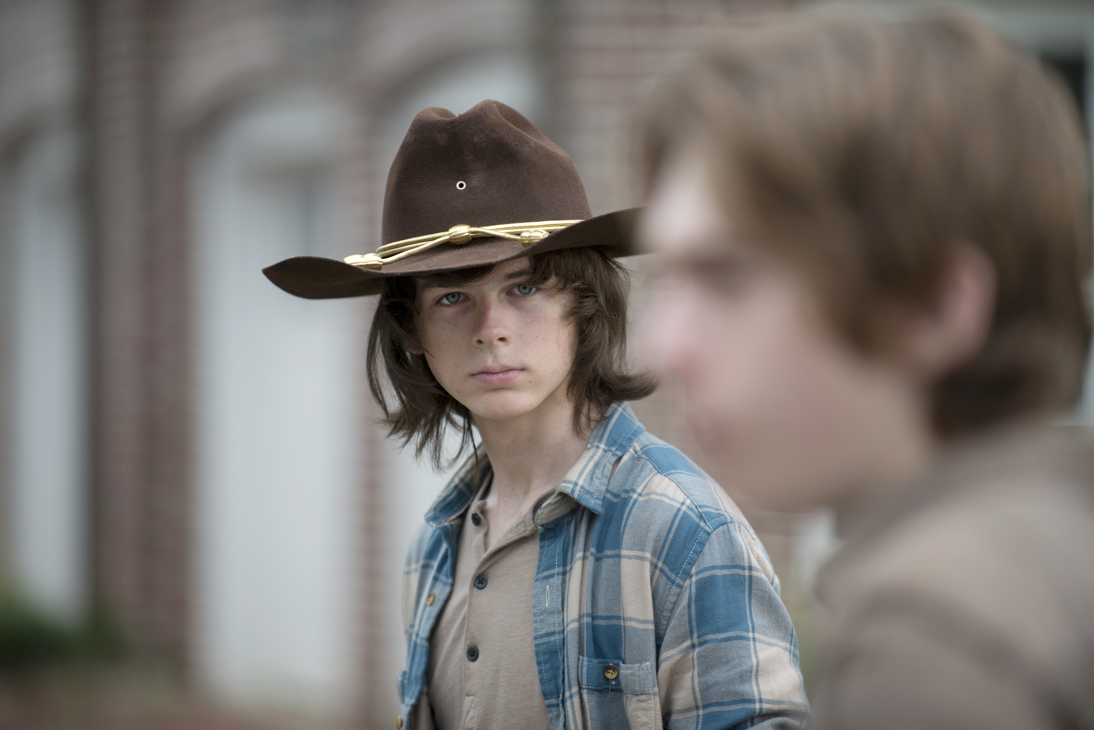 Still of Chandler Riggs and Austin Abrams in Vaiksciojantys negyveliai (2010)