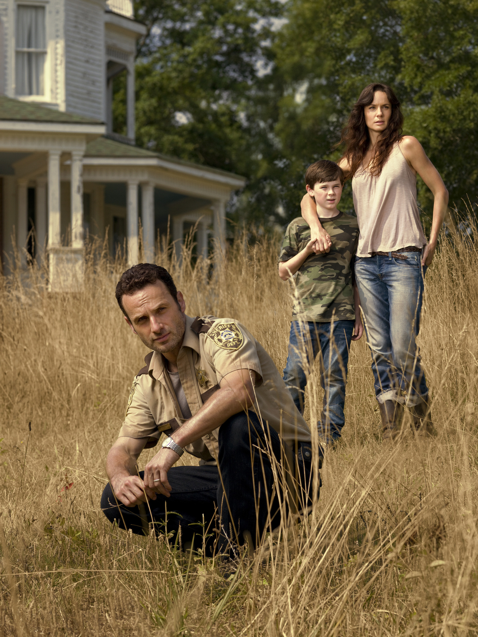 Still of Andrew Lincoln, Sarah Wayne Callies and Chandler Riggs in Vaiksciojantys negyveliai (2010)