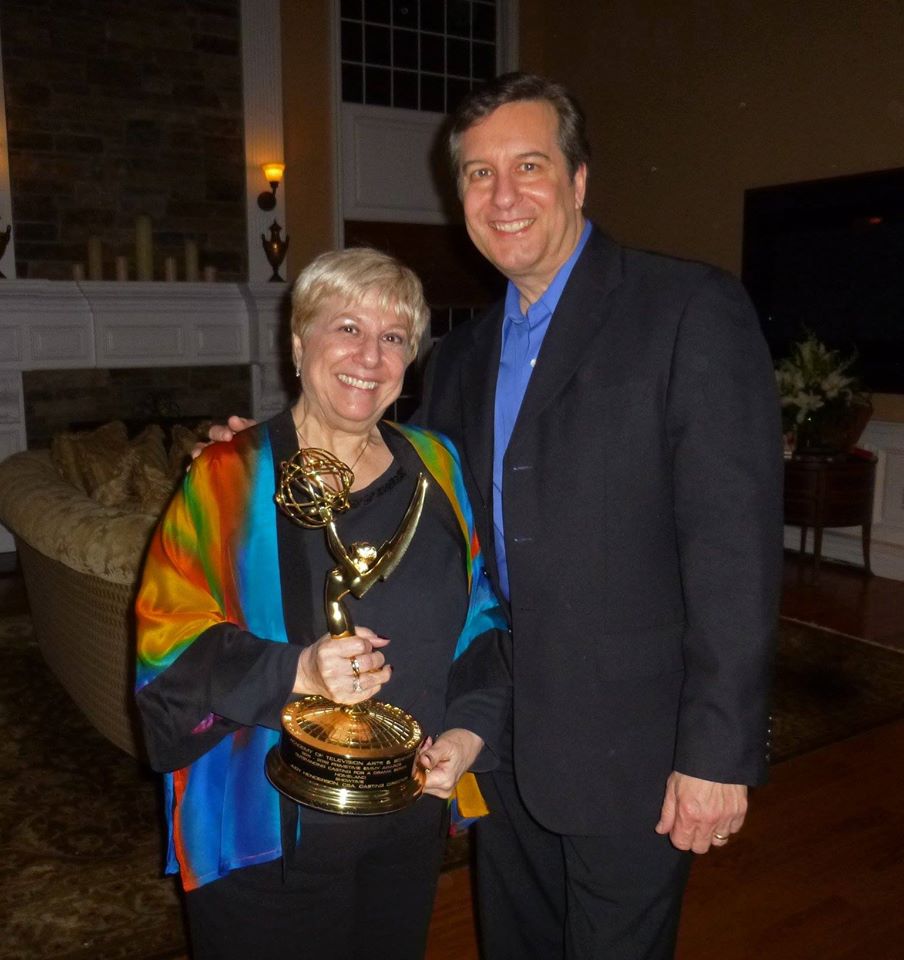 Tom Wardach with Judy Henderson and her Emmy.