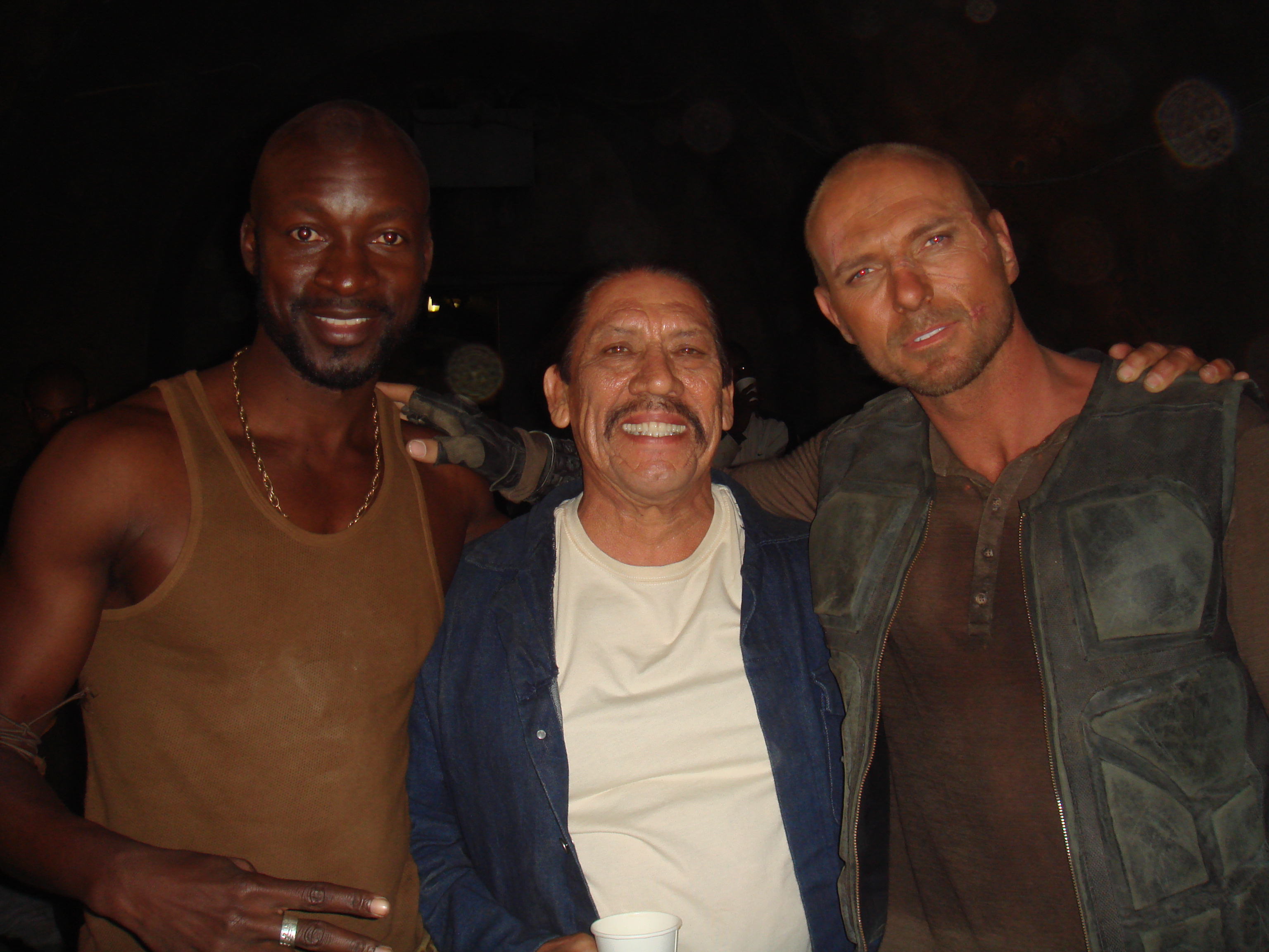Eugene Khumbanyiwa as Nero with Danny Trejo and Luke Goss on Death Race Inferno' set. Cape Town, South Africa