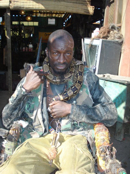Eugene Khumbanyiwa as Obesandjo on set of the four time Oscar nominated District 9 (2008)