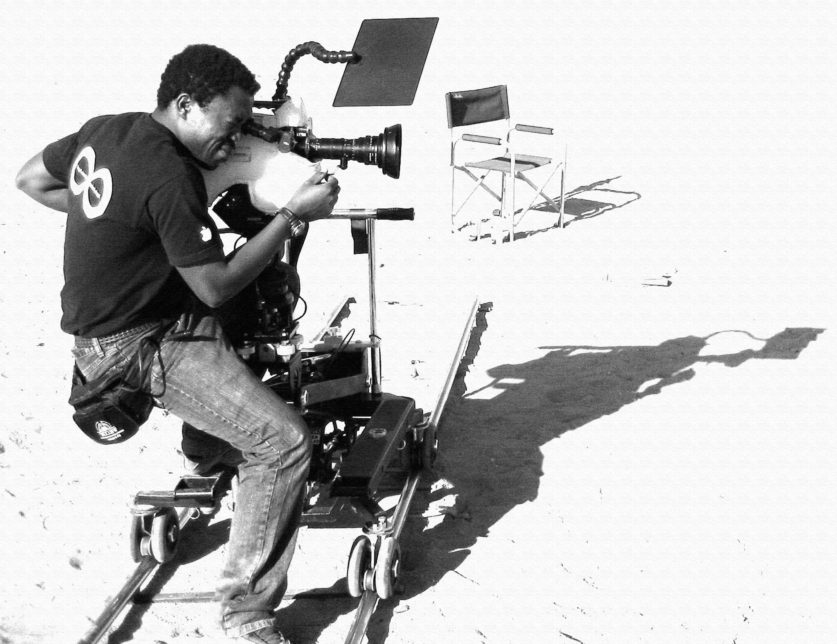 Director/Camera Operator Dee Asaah captures a shot on the set of the action thriller Blood Sun Town.