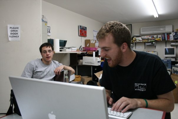 Michael Wickham (right) with his friend and writing partner, Stephen Hensel, working late into the night on a Team Midas script.