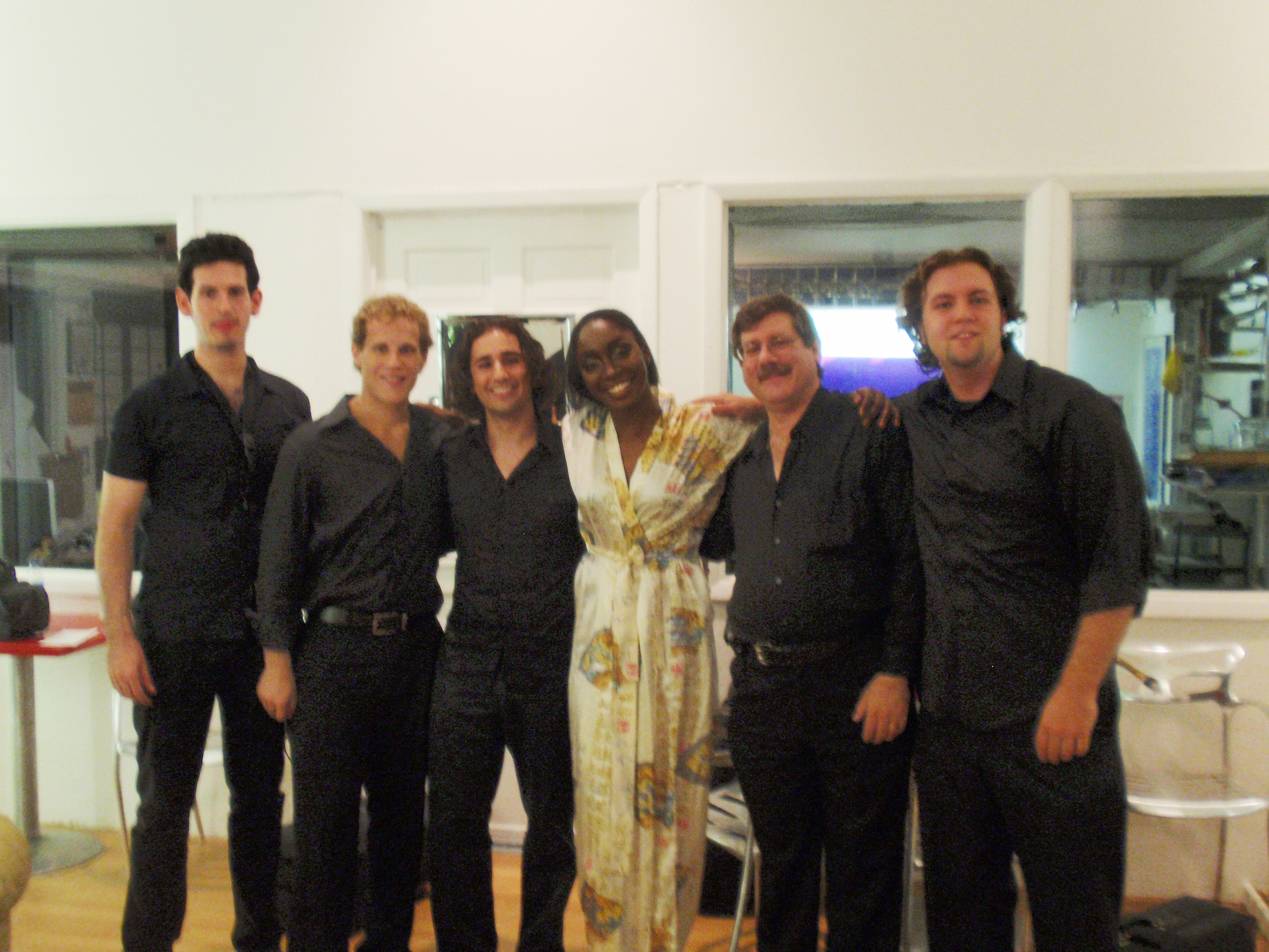 Patrick Pizzolorusso with Tinu and fellow Sax players on the set of 
