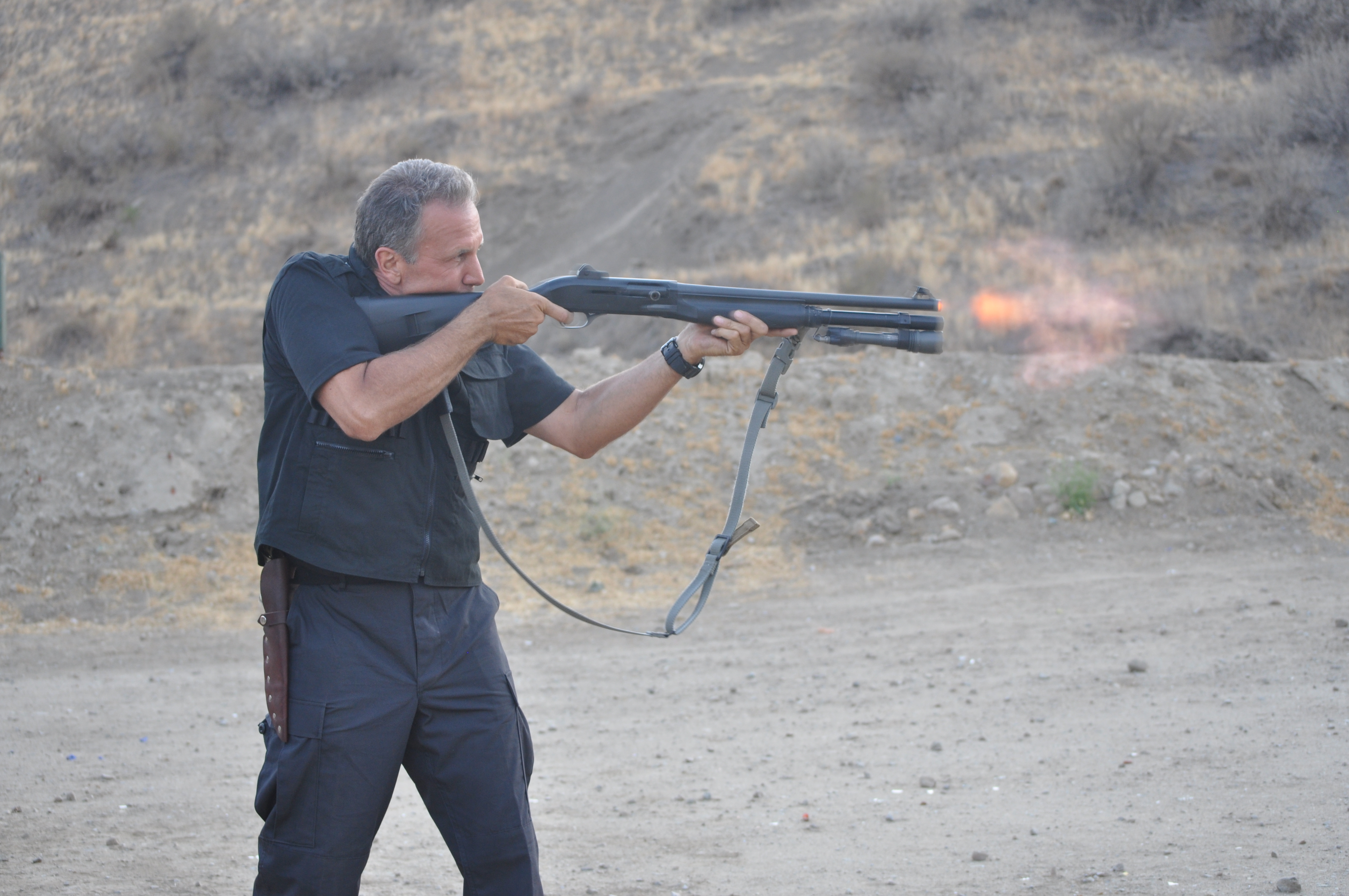 Andre 'Relentless'Alexsen Director /Host/Weapons expert on set of my new TV show instructing on how to properly use the the 12 gag auto loader shot gun magnum loads suggested