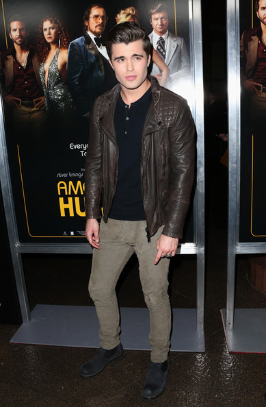 Spencer Boldman arrives at the premiere of American Hustle