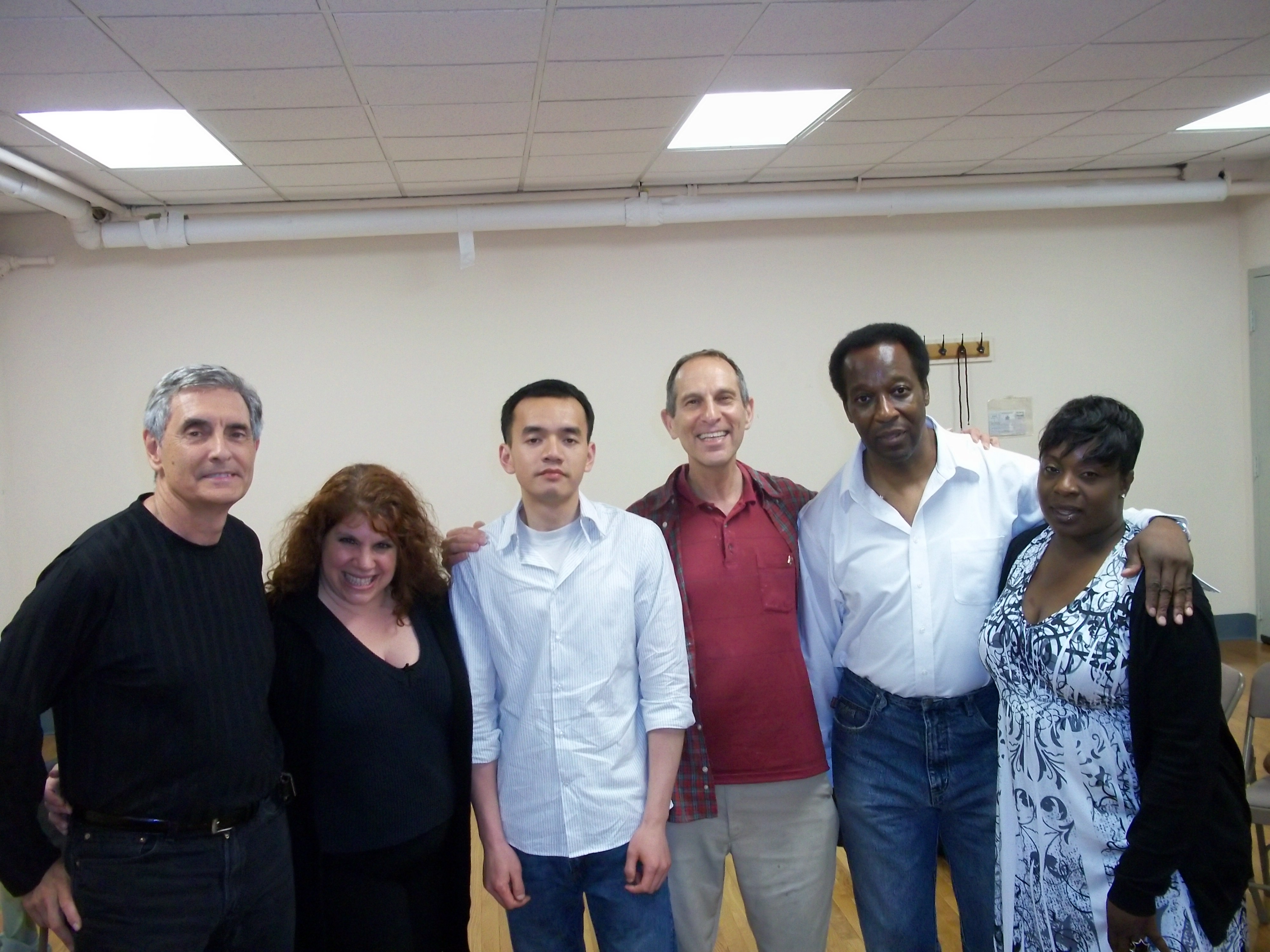 Phil, center, with the cast of Blacks and White.
