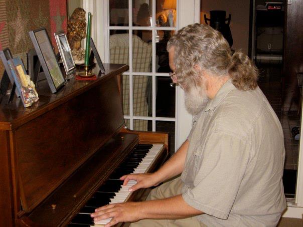 Mark Connelly Wilson plays upright piano - writing music for 