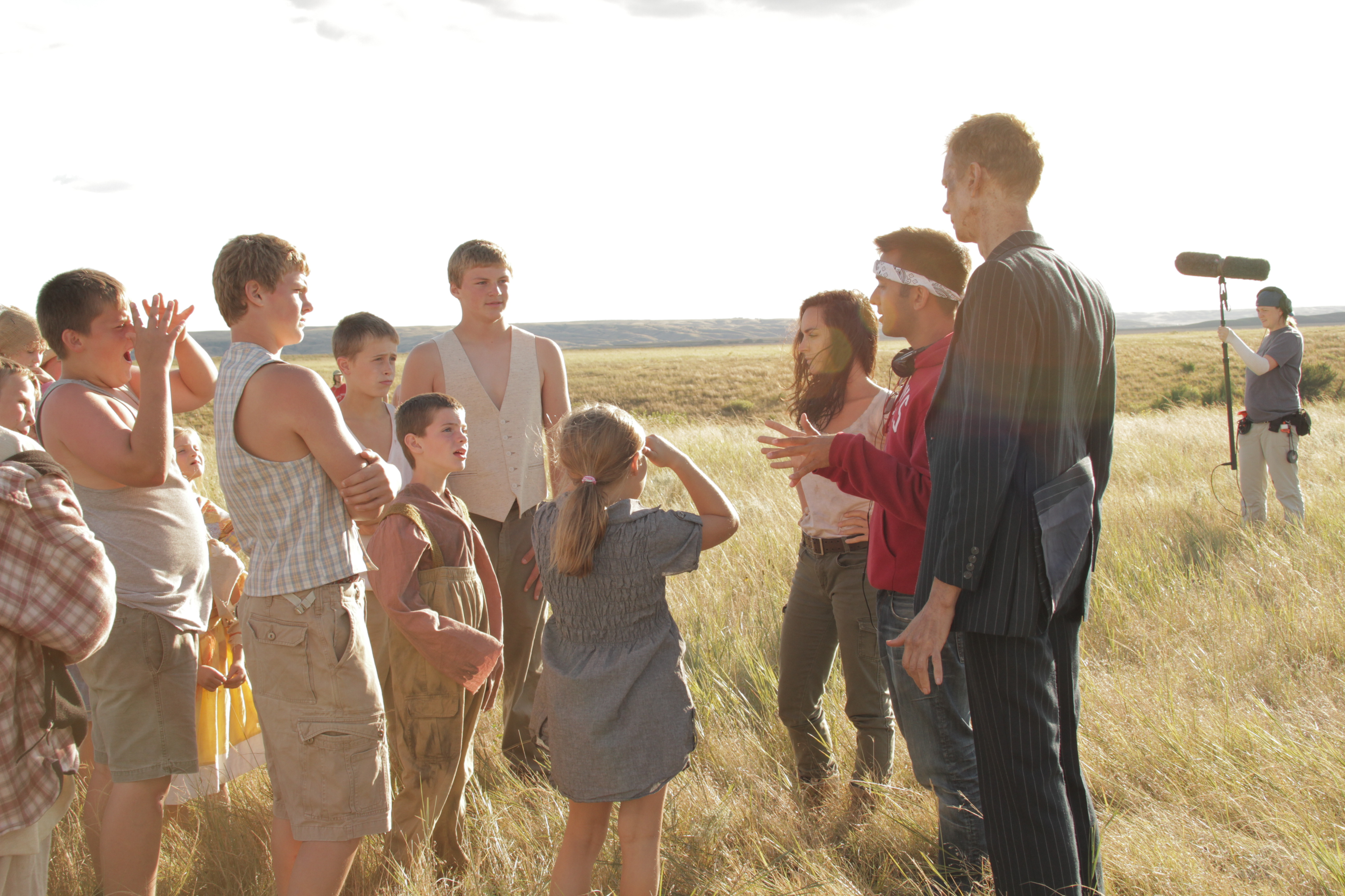 Directing a gaggle of children (and Doug Jones!) on the set of 'Dust of War'