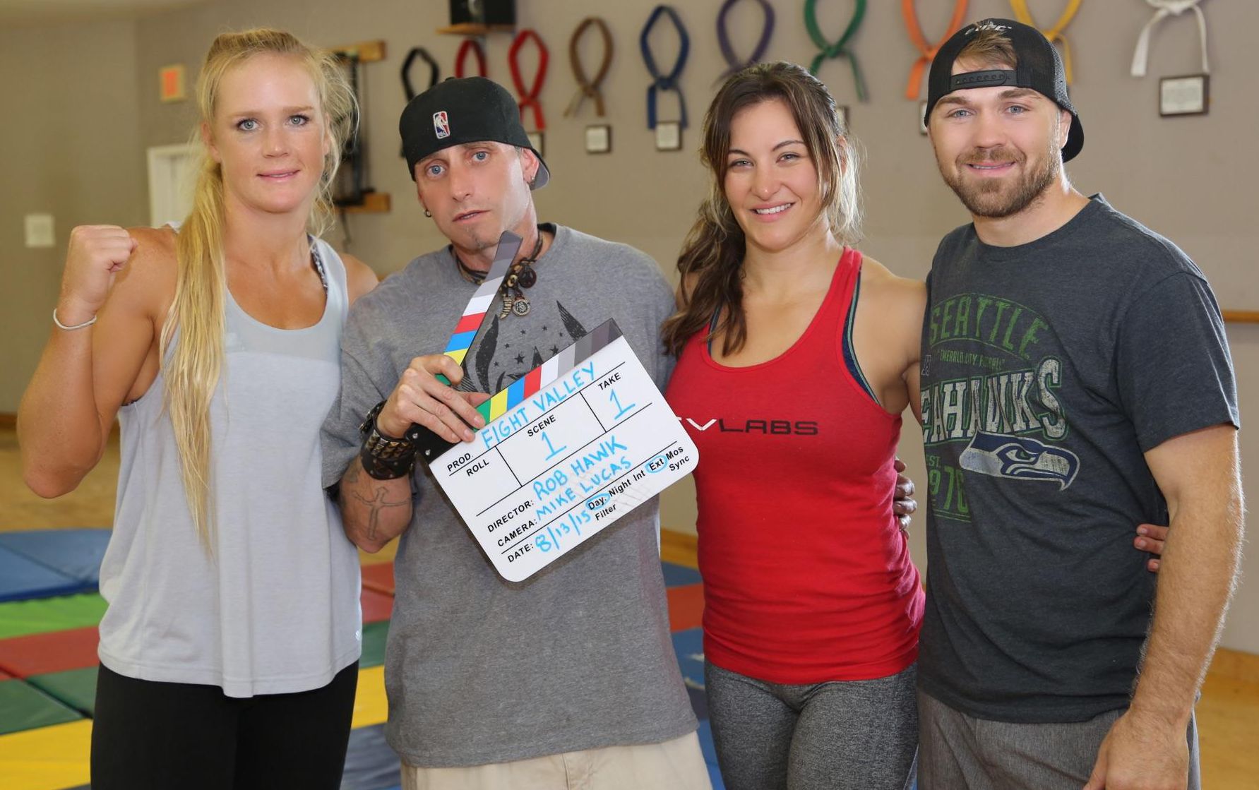 DIrector Rob Hawk with UFC fighters Holly Holm, Miesha Tate, and Bryan Caraway